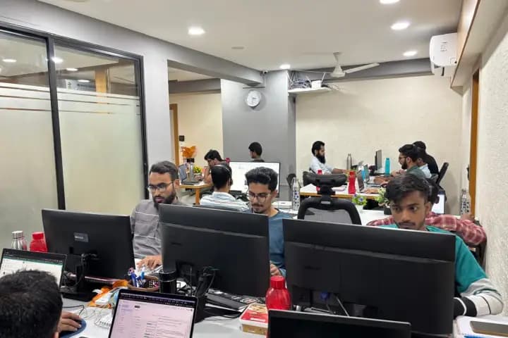 NNT Software developers collaborating in the office